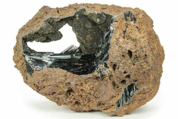 Emerald-green vivianite crystals in phosphatic nodule< from Brazil.